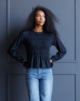 Black Beauty Smocked Peplum Top