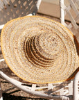 Balinese Pecatu Wide Round Straw Hat In Butter Yellow