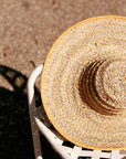 Balinese Pecatu Wide Round Straw Hat In Butter Yellow