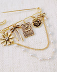 Floral Ribbon Pin Brooch – Elegant Gold Safety Pin with Charms and Pearl Chains