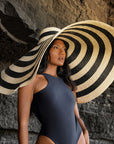 The Solana Oversized Striped Straw Hat in Black & Natural