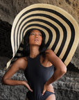 The Solana Oversized Striped Straw Hat in Black & Natural