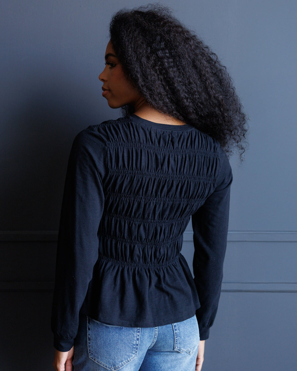 Black Beauty Smocked Peplum Top