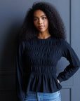 Black Beauty Smocked Peplum Top