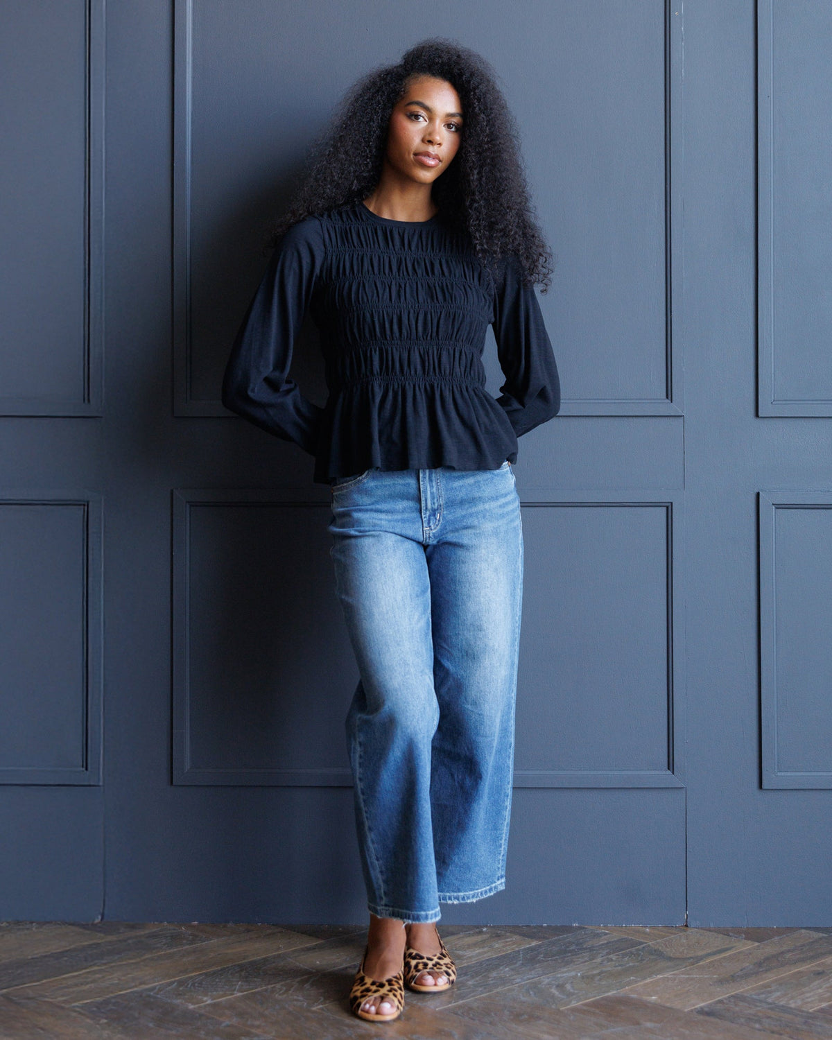 Black Beauty Smocked Peplum Top