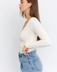 Le Lis Long Sleeve Surplice Bodysuit