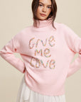 Listicle Give Me Love Stitched Mock Neck Sweater