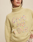 Listicle Give Me Love Stitched Mock Neck Sweater