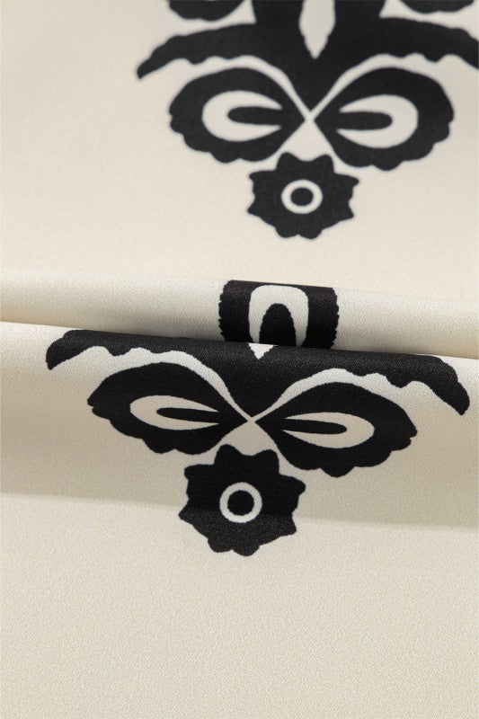 Geometric Sleeveless Hollow Bow-Back Mini Dress