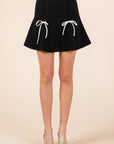 GeeGee 2-Bow Pleated Mini Skirt