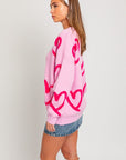 LE LIS Long Sleeve Round Neck Heart Printed Sweater