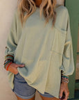 Ribbed tab sleeve oversize pocket top