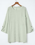 Ribbed tab sleeve oversize pocket top