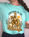 Something in the Orange Cowgirl Graphic Tee