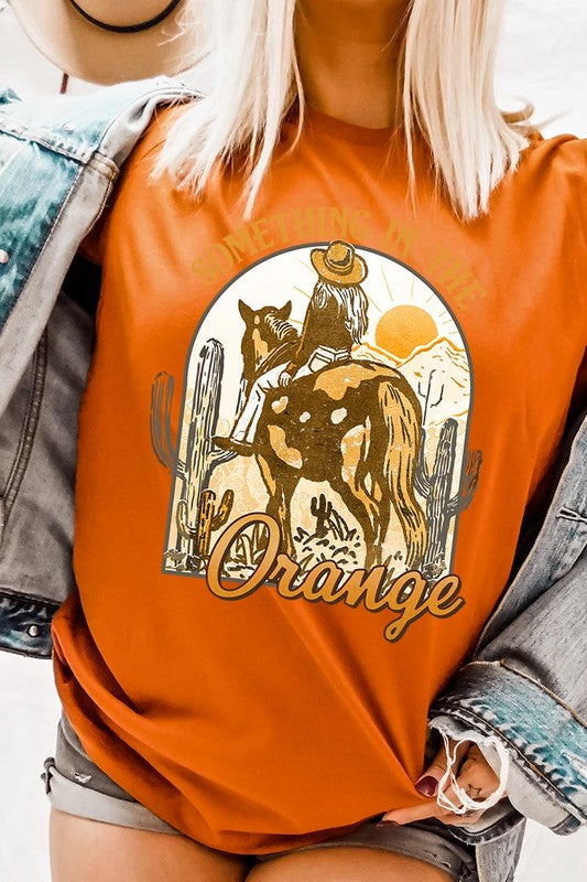 Something in the Orange Cowgirl Graphic Tee