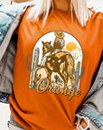 Something in the Orange Cowgirl Graphic Tee