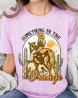 Something in the Orange Cowgirl Graphic Tee