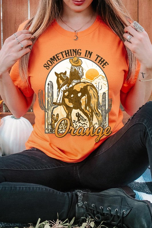 Something in the Orange Cowgirl Graphic Tee