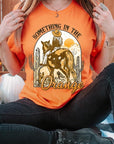 Something in the Orange Cowgirl Graphic Tee