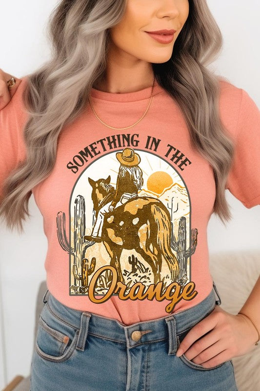 Something in the Orange Cowgirl Graphic Tee