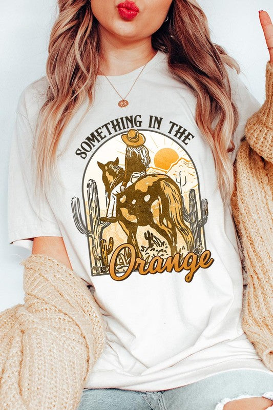 Something in the Orange Cowgirl Graphic Tee