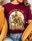 Something in the Orange Cowgirl Graphic Tee