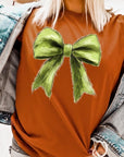 Grinchmas Coquette Bow Graphic Tee