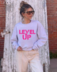 Pink Ink Level Up Graphic Crew Sweatshirt