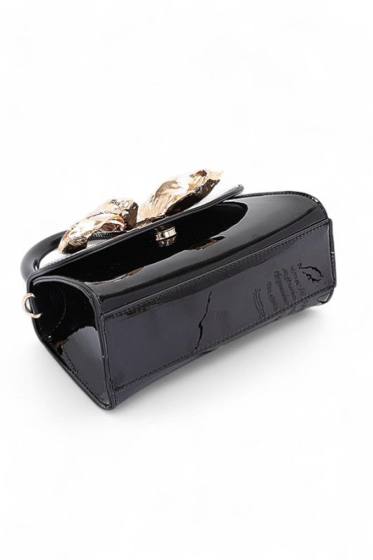 Iconic Metal Bow Top Handle Faux Leather Bag