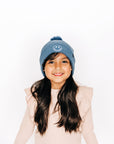 Blue Smiley Pom Pom Hat