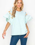 Rinnie Pointe Knit Top with Embroidered Flower Sparkles