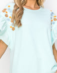 Rinnie Pointe Knit Top with Embroidered Flower Sparkles