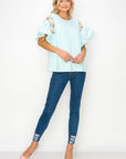 Rinnie Pointe Knit Top with Embroidered Flower Sparkles