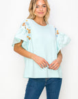 Rinnie Pointe Knit Top with Embroidered Flower Sparkles