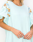 Rinnie Pointe Knit Top with Embroidered Flower Sparkles