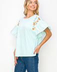 Rinnie Pointe Knit Top with Embroidered Flower Sparkles