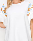 Rinnie Pointe Knit Top with Embroidered Flower Sparkles