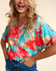 e Luna PLUS Drop Shoulder Dolman Banded Floral Woven Top