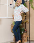 Celeste Full Size Leaf Print Contrast Trim Balloon Sleeve Top