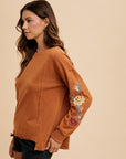 Annie Wear Embroidered Long Sleeve French Terry Top