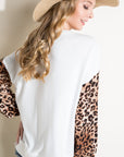 e Luna Animal Mixed Volume Sleeve Top