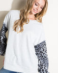 e Luna PLUS Animal Mix Volume Sleeve Top