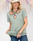 Celeste Full Size Crisscross Cutout Leopard Contrast Trim T-Shirt