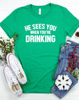 He Sees You When Your Drinking Graphic Tee