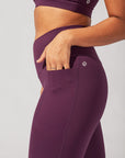 POPFLEX Full Size Crisscross Hourglass® Flared Leggings with Pockets - Winter Plum