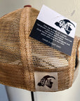 Back view of the same hat showing the tan mesh back and an adjustable snap closure. A small tag with the 'GOAT' logo is attached near the snaps.