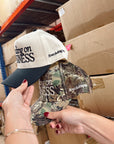 Standing On Business Trucker Hat