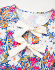 Floral Bow Tie Sleeveless Peplum Blouse