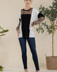 Celeste Full Size Leopard Color Block Exposed Seam T-Shirt