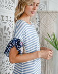 e Luna Striped Woven Floral Ruffle Top